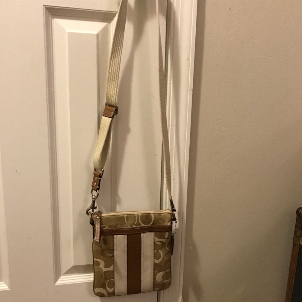 Authentic Coach cross body bag.