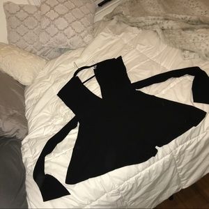 Deep v neck in the front, romper, dips up and ties