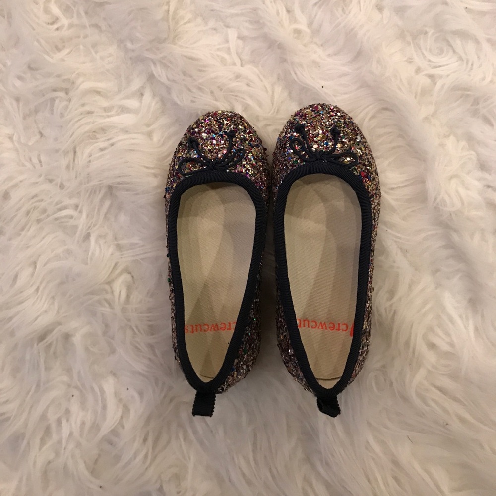 Girls sparkly flats.