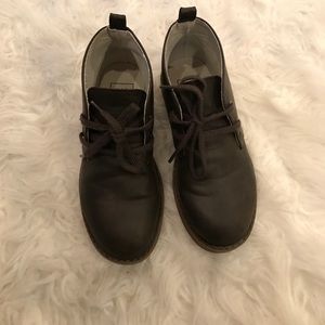 Boys brown leather boots.