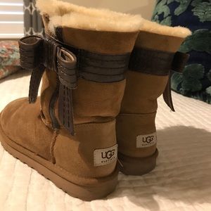 Tan uggs with brown bow Tan uggs with brown bow