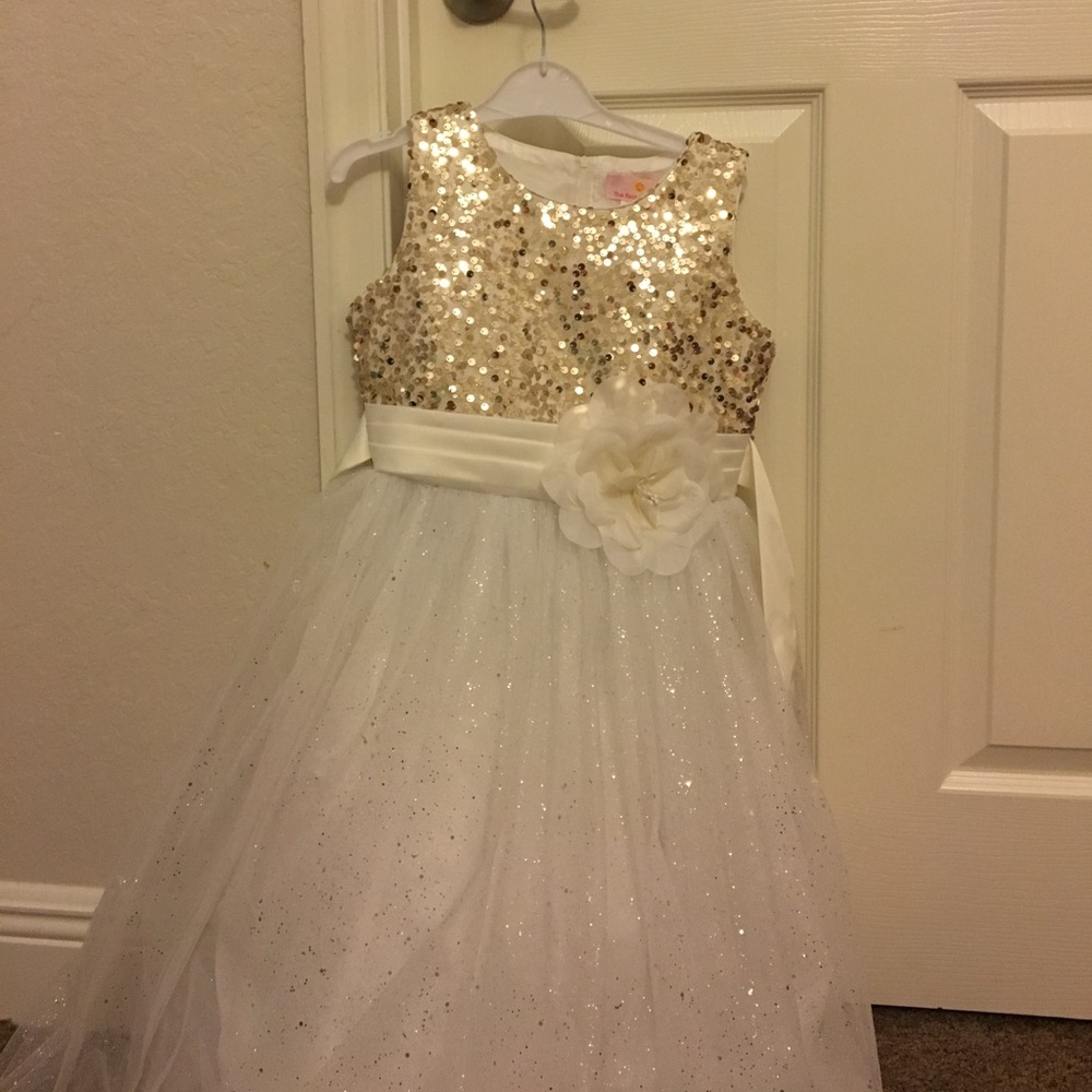 White and gold sparkle pageant dress.