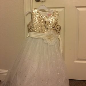 White and gold sparkle pageant dress.
