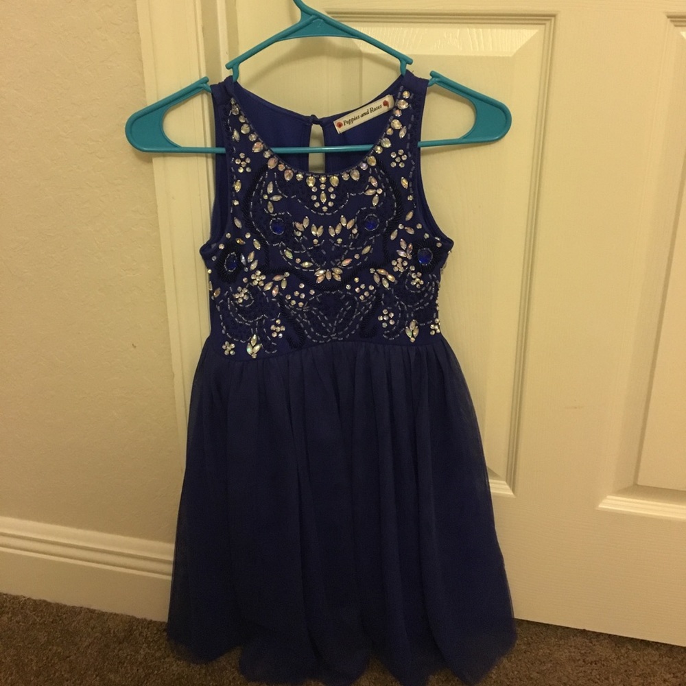 Dark blue pageant dress.