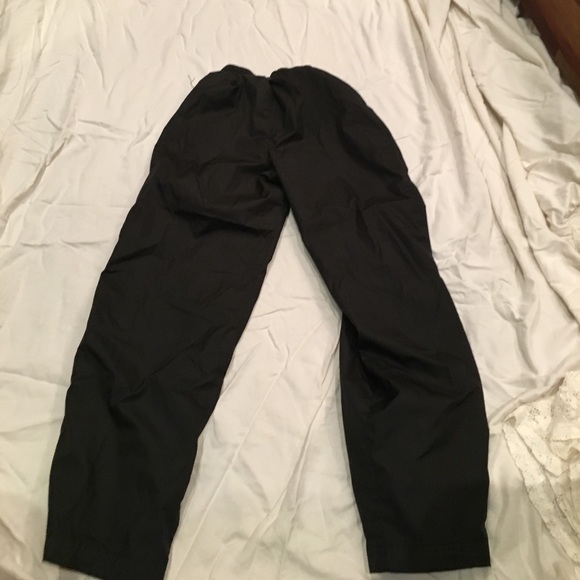 Boys pants that are black with a grey stripe - Picture 2 of 4
