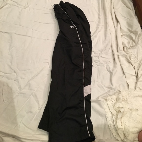 Boys pants that are black with a grey stripe - Picture 3 of 4