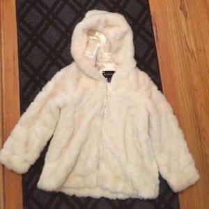Girls white faux fur coat.