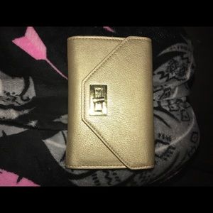 Charming Charlie gold wallet