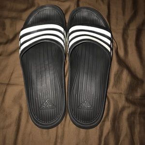 ADIDAS slides size 13. Used but in good shape.