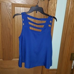 Blue tank with cutouts