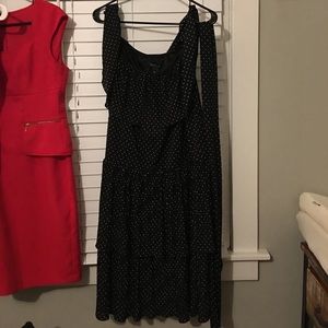 Black and white ruffled polka dot dress.