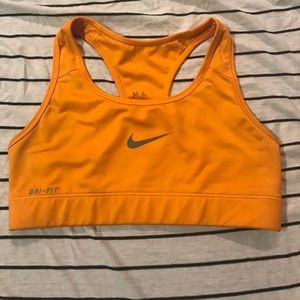 pretty orange Nike Pro sports bra size XS