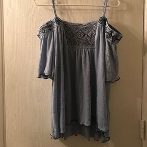 Four dresses and one shoulder cut shirt