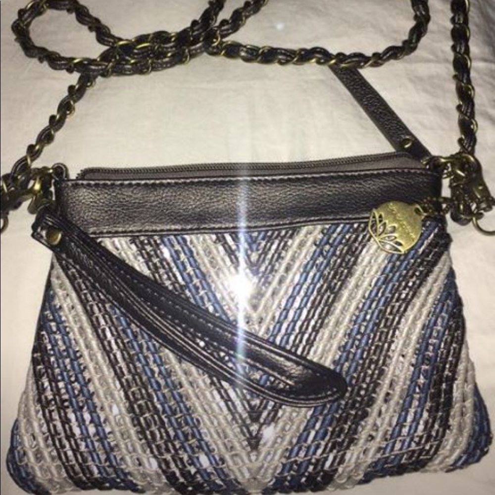 Cross body, wristlet or clutch