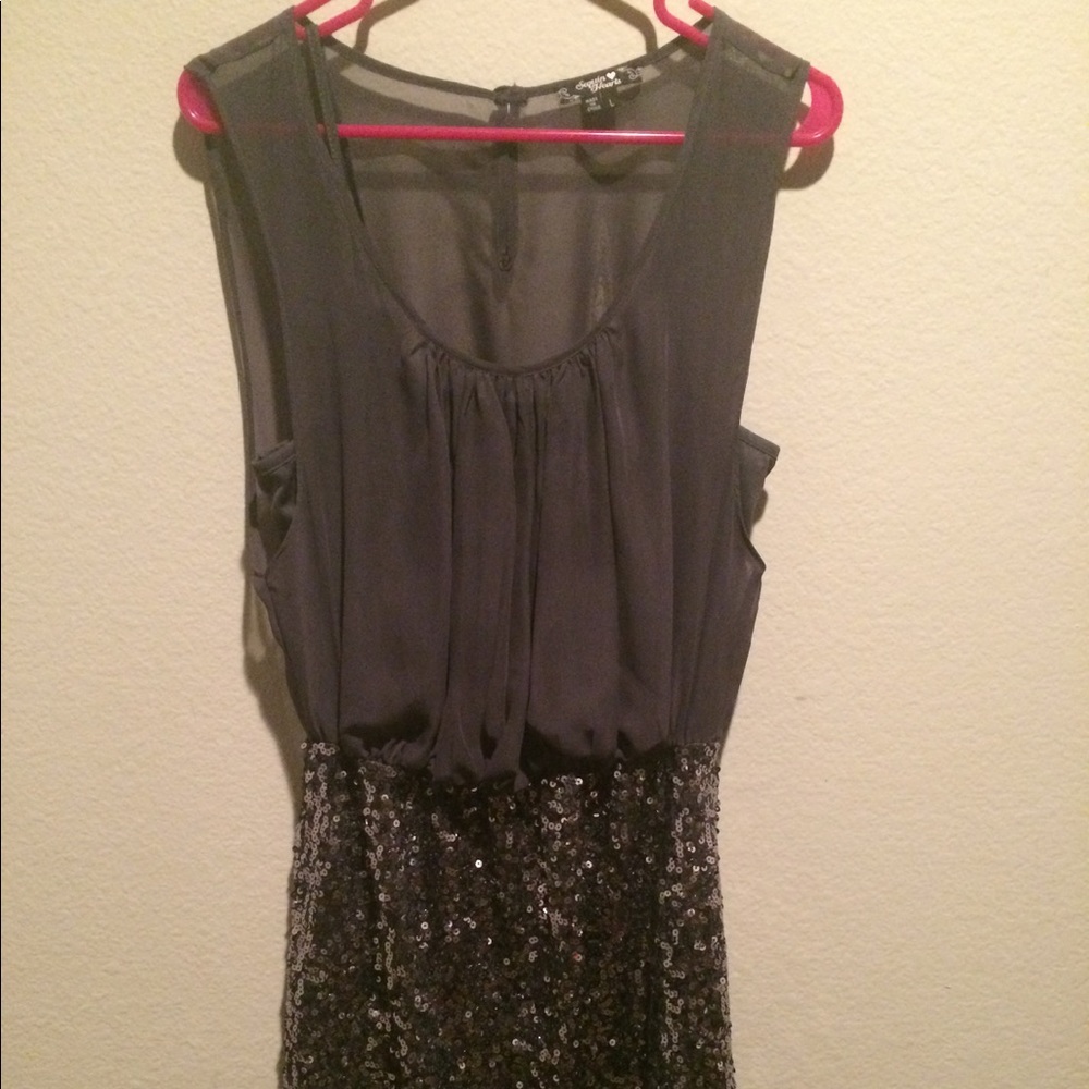 Silver cocktail dress. Sequins on the bottom half