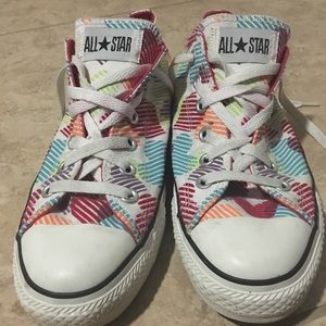 Converse sneakers with multi colored hearts