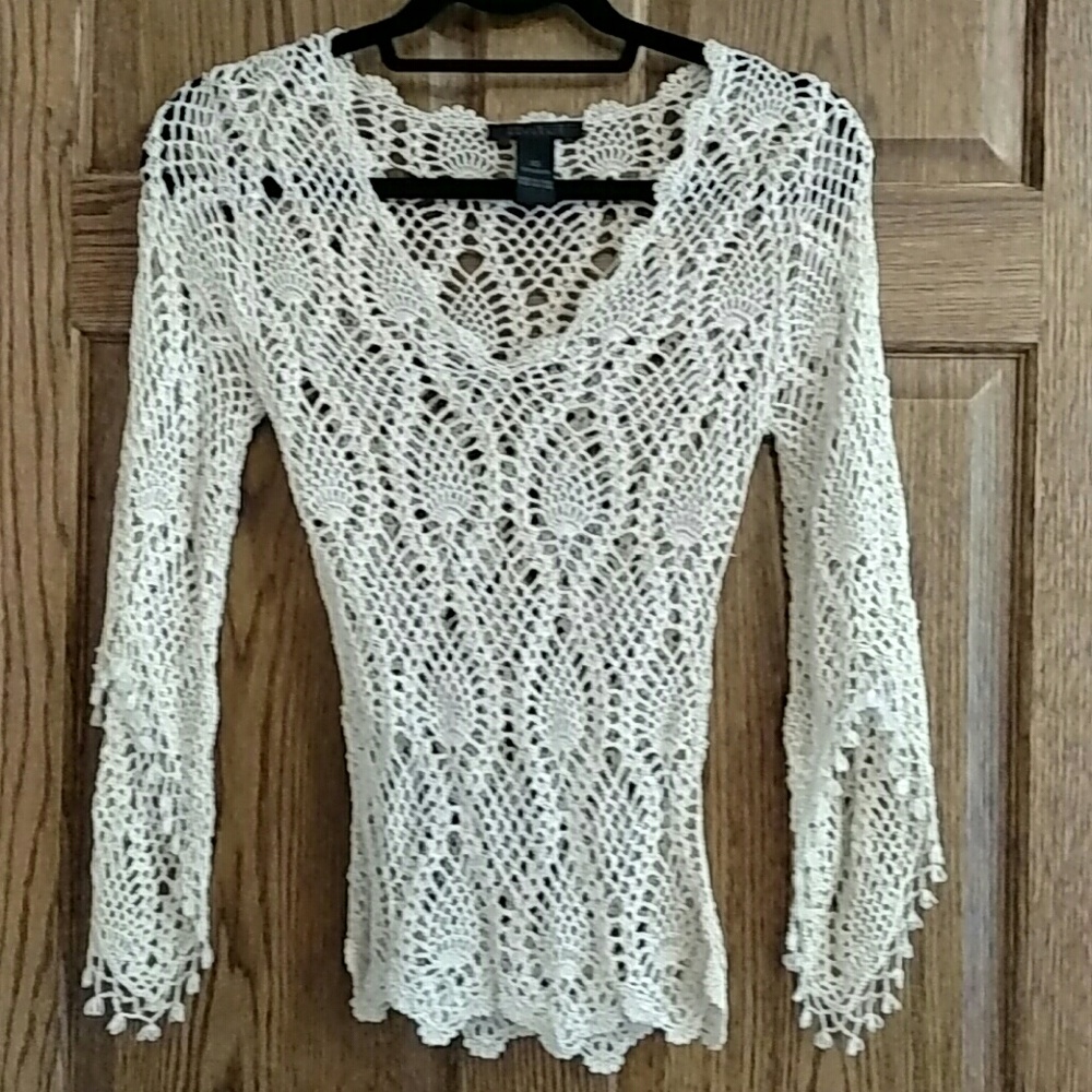 Limited handknit top.