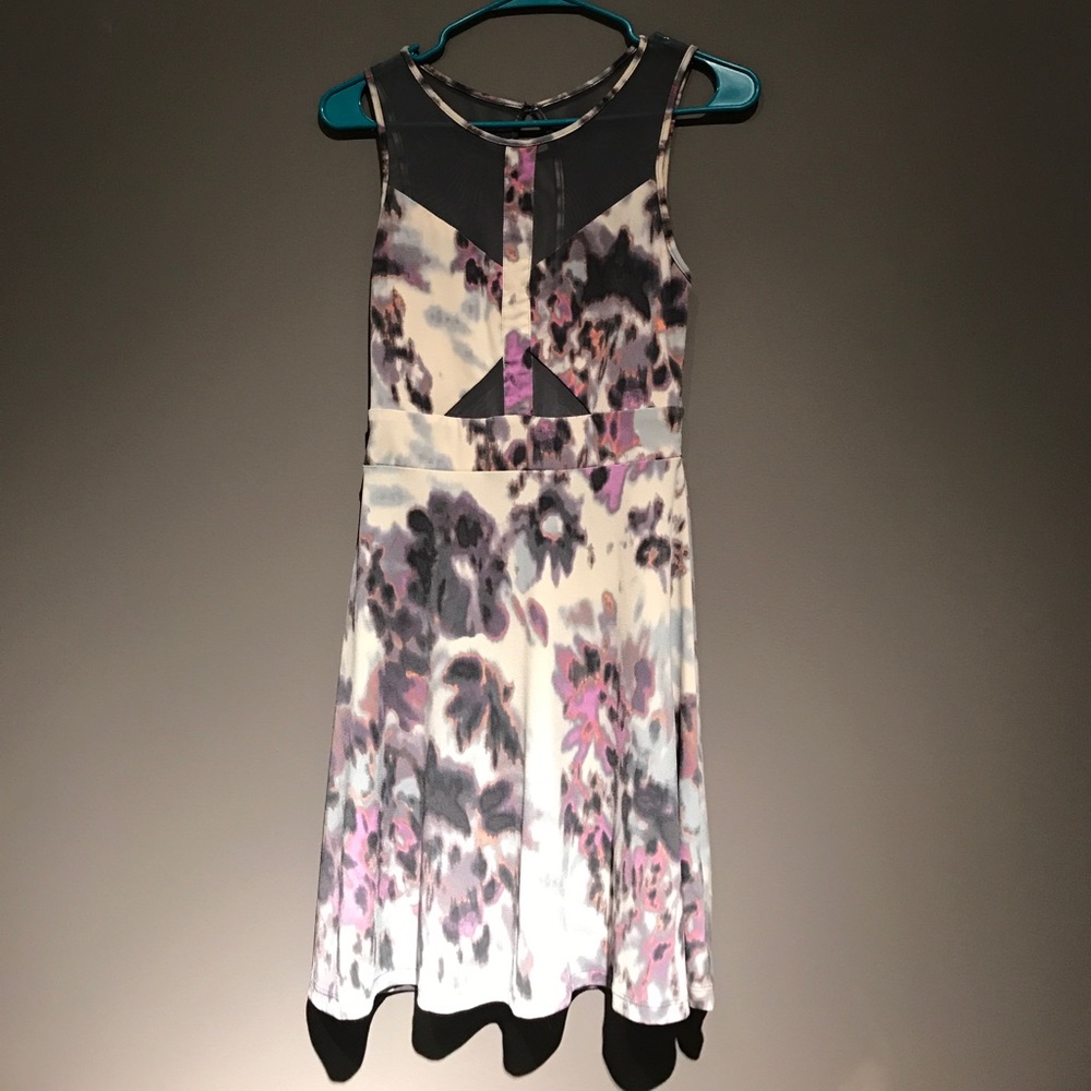 Really fun unique party dress with mesh cut outs!