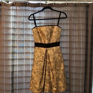 Dolce and Gabbana gold and black jacquard dress.