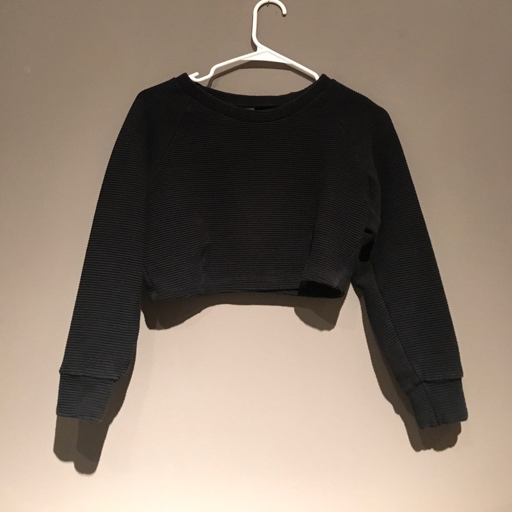 Black long sleeve crop top with rubbed pattern