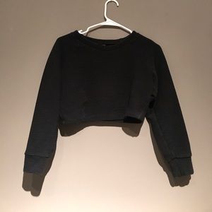 Black long sleeve crop top with rubbed pattern