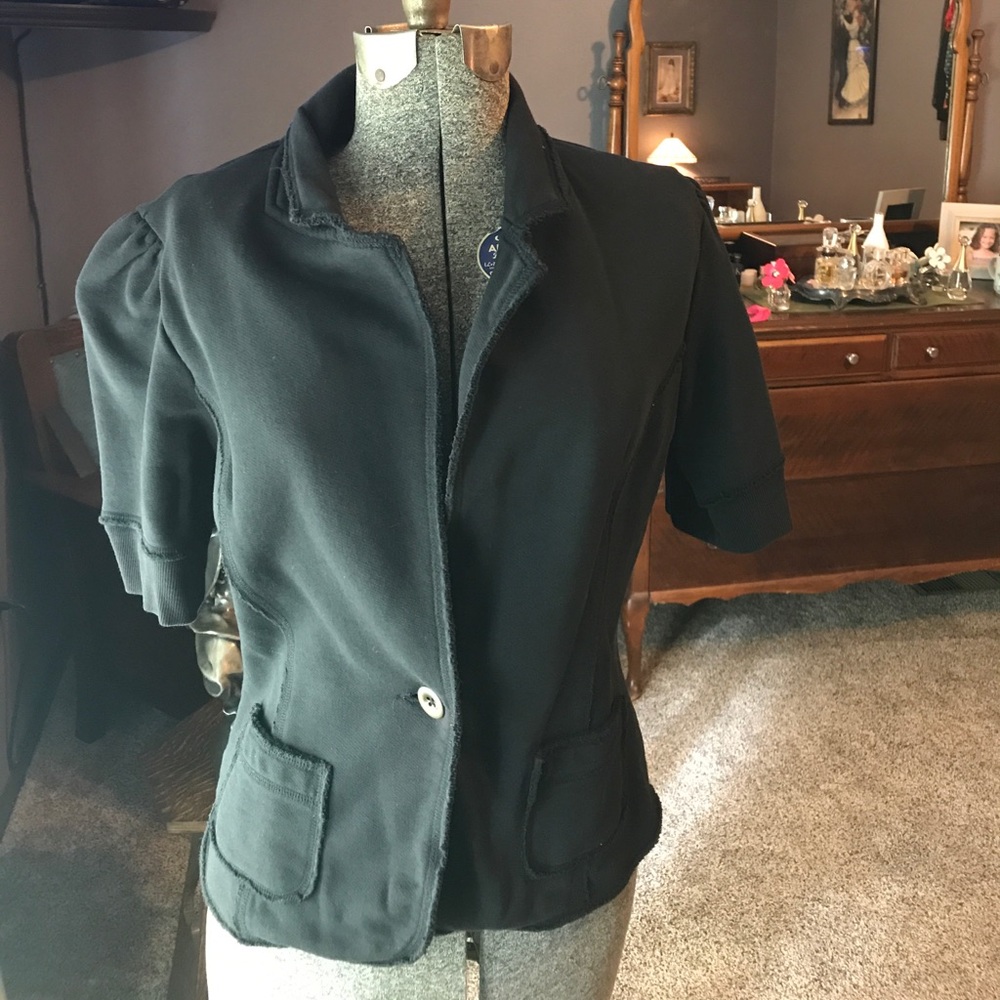 Black casual blazer-like jacket.