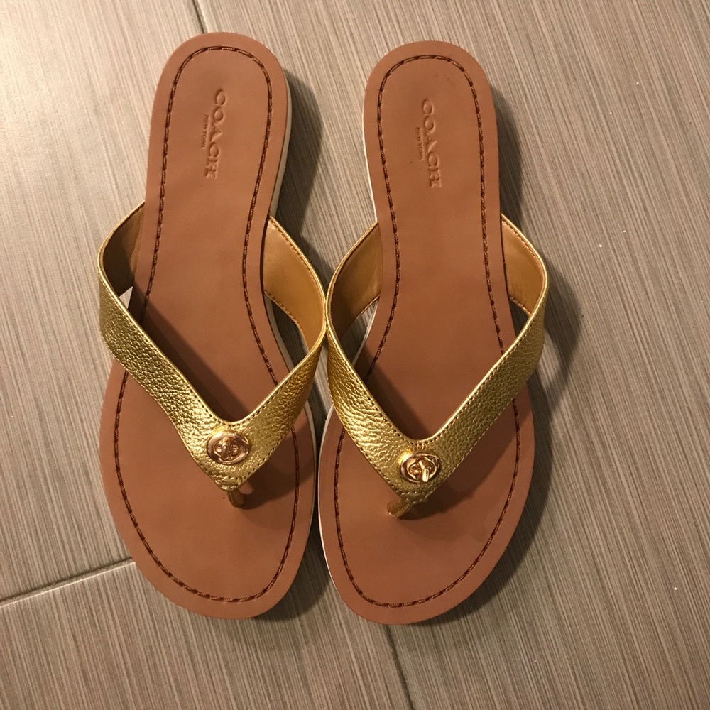 Gold coach flip flops never worn, no box