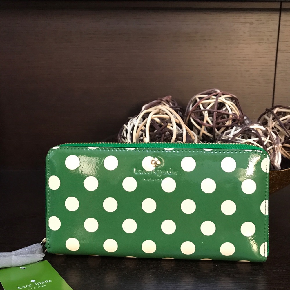 Kate spade green and white polka dot wallet