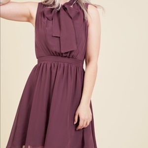Give it timeless A-line dress is aubergine