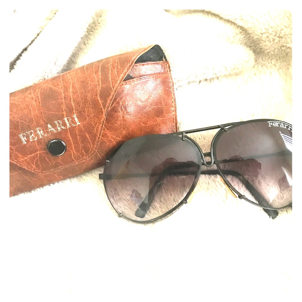 Authentic vintage Ferrari aviator sunglasses.