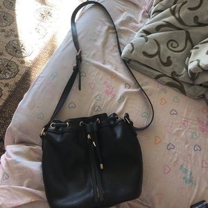 Black gently used bucket bag