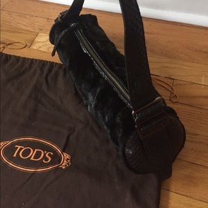 Tod’s sheared mink and snakeskin trim baguette bag