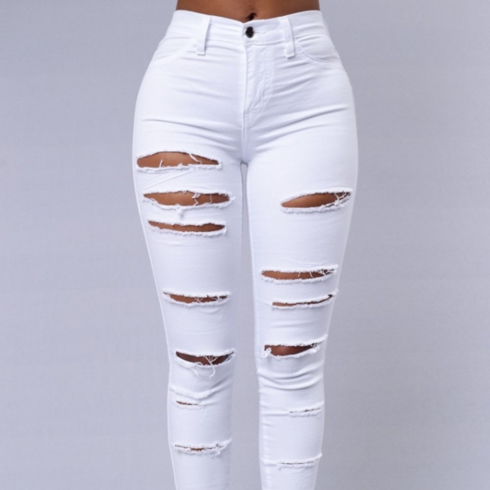 high-waisted white ripped jeans