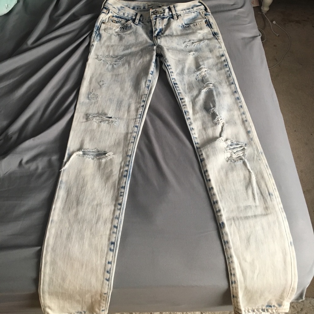 Abercrombie Kids light washed ripped jeans.