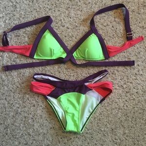 Multi colored bathing suit. NEVER WORN