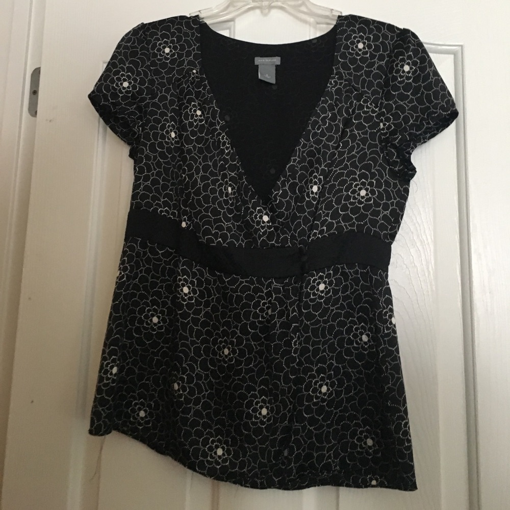Black floral patterned wrap top.