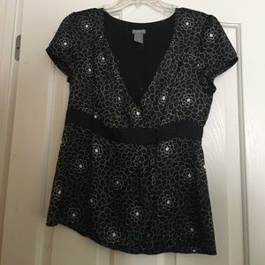 Black floral patterned wrap top.