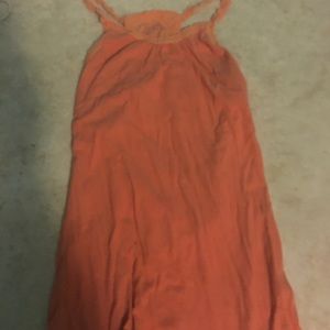 This is a two toned orange tank top
