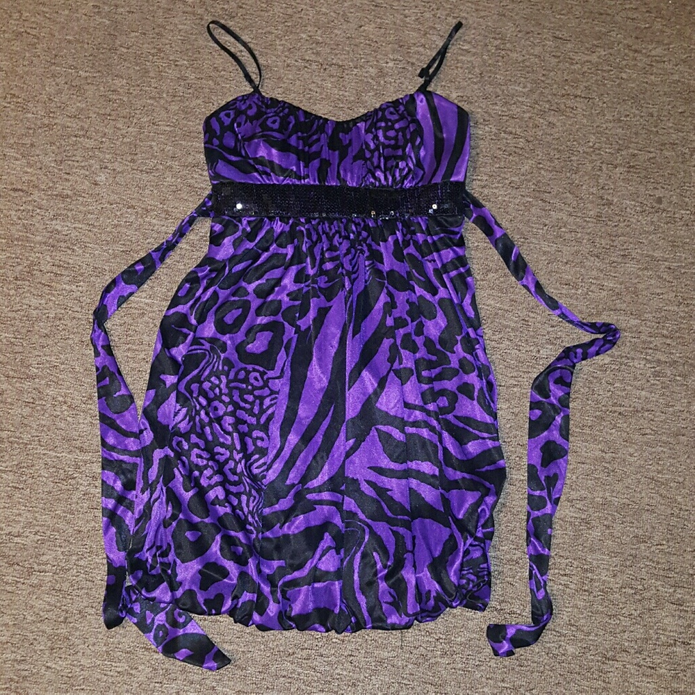Purple animak print dress.