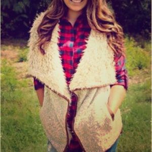 Faux shearling vest with faux leather trim Faux shearling vest with faux leather trim