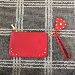 Tory burch wristlet.