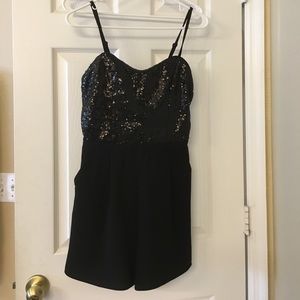 Black sequin romper with pockets