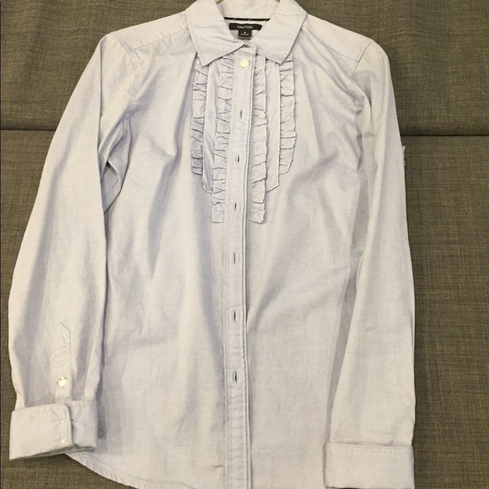 Pretty Blue button down blouse with ruffles.