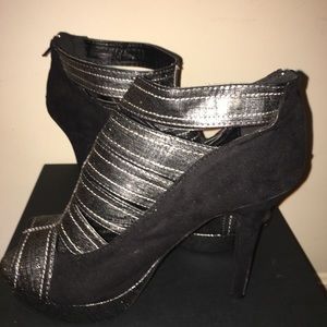Ashley Stewart silver and black peep toe heels.