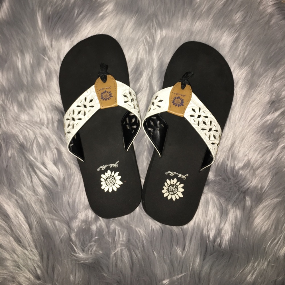 Yellow box flip flops