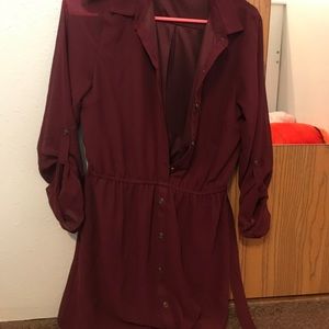 A silky maroon dress with cropped sleeves