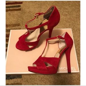 Red t-strap high heel shoes