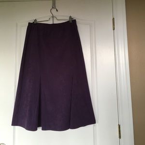 Skirt with pleats front and back.