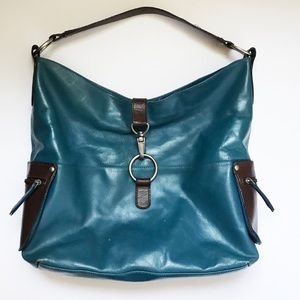 Cleo & Patek medium blue w/ brown details hobo bag