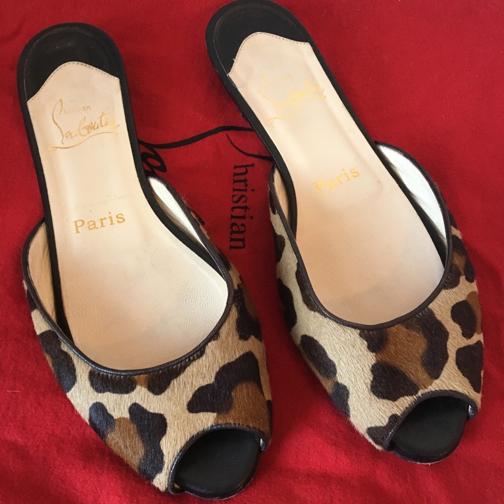 Christian Louboutin leopard slides